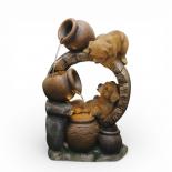 Градински фонтан кученца с делви